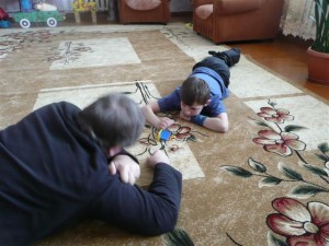 On the Floor Playing Connect Four